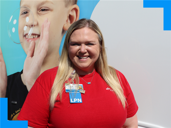  Shannon Jones standing in front of the CoxHealth CARE Mobile.